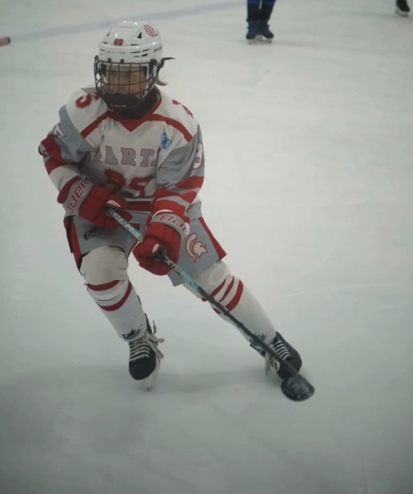 Forward driving through the neutral zone with the puck